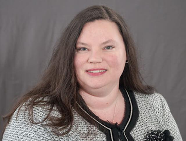 headshot photo of Marcie Purser
